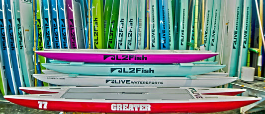 a photo showing several live paddleboards stacked on top of each other